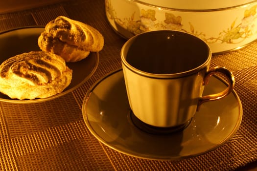 a cup of tea with zephyr on a candle light