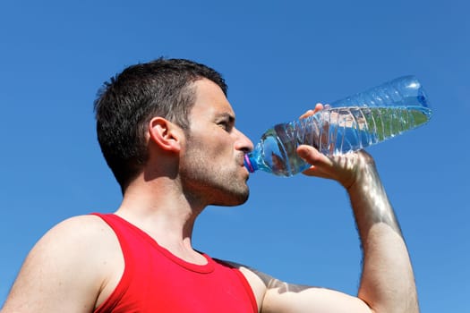 man drinking water