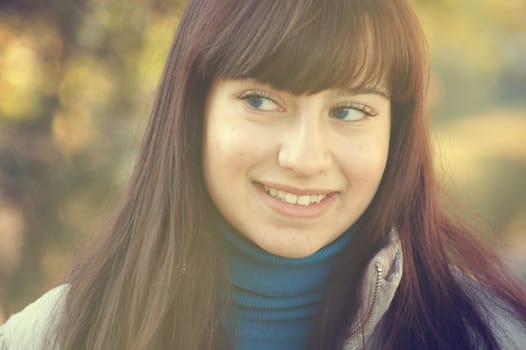 vintage mood - Pretty happy smiling latin woman headshot closeup