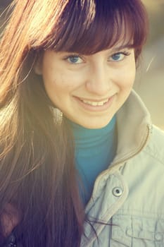 vintage mood - Pretty happy smiling latin woman headshot closeup
