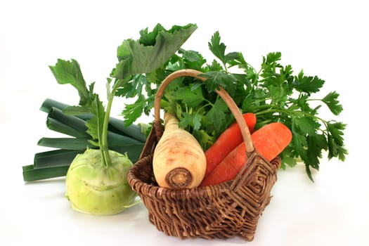 a basket with various soup vegetables