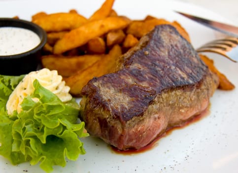 Steak with dip,potato wedges,butter