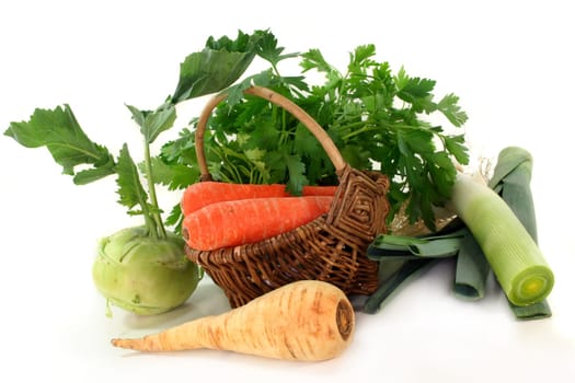 a basket with various soup vegetables