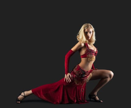 Beauty young dancer - red traditional arabian costume