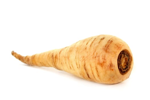a parsnip root against a white background