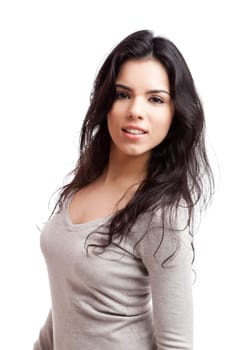 Portrait of a beautiful young woman smiling, isolated over white background