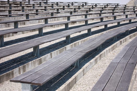 Open theater wood banks on sunny day
