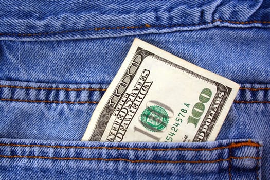 A One hundred dollar bill in jeans pocket
