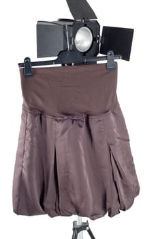 Shot of skirt hanging on studio lighting