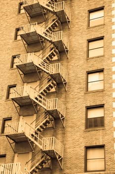 Fire escape ladder on a old brick apartment building