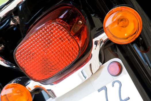 Close-up view of motorcycle rear lights