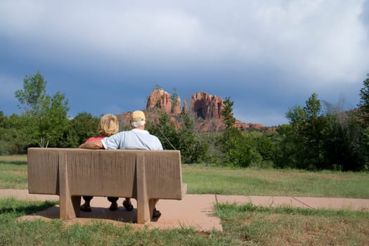 A senior couple enjoying the view of Cathedral Rock near Sedona, Arizona