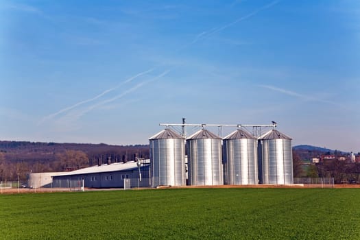 silo and acre in beautiful light with clear sky