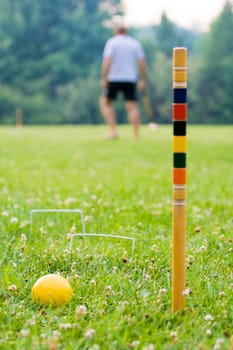Game of croquet scene