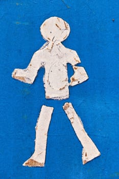 symbol for pathway and icon for pedestrians on asphalt