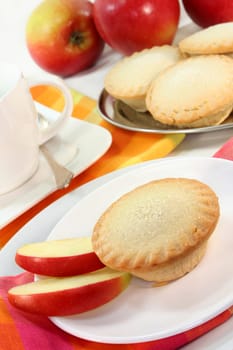 Apple cakes on a small white plate