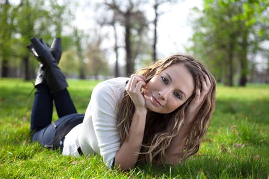 Young woman relaxing on a sunny day in park