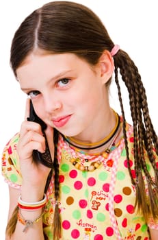 Close-up of a girl talking on a mobile phone isolated over white