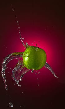 Water Splashes on Apple