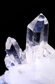 Quartz crystals on black background