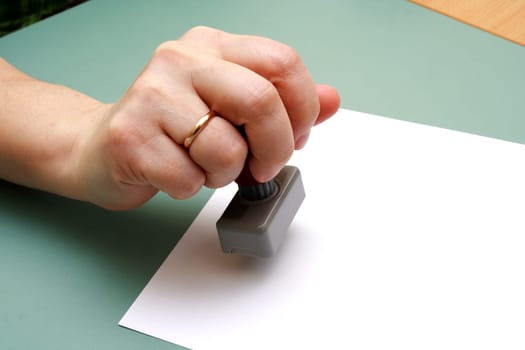 image of doctor stamp in the women hand