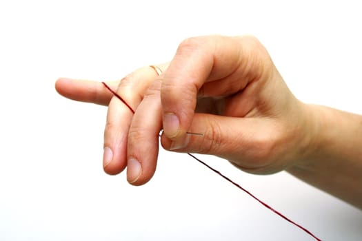 Needle and thread for sewing in the women hand