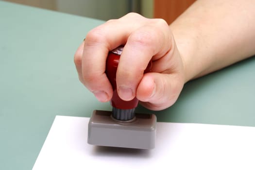 image of doctor stamp in the women hand