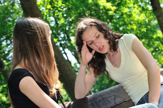 Friends series - one teenage girl comforts another which has serious problem