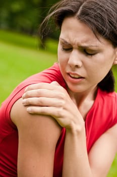 Shoulder injury - sportswoman in pain
