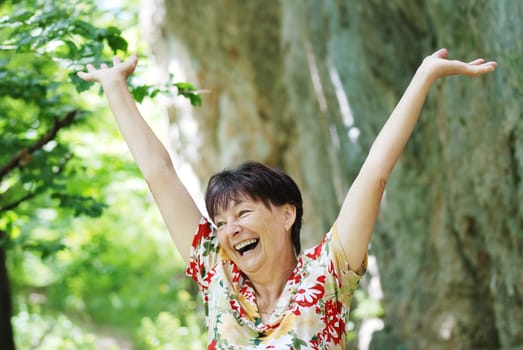 Senior woman enjoys life outdoors