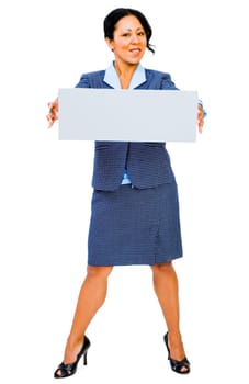 Confident businesswoman showing a placard and posing isolated over white