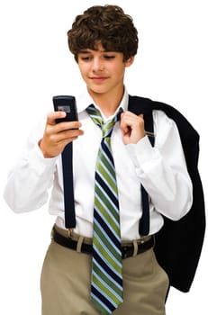 Smiling boy text messaging on a mobile phone isolated over white