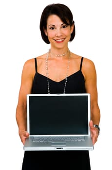 Woman showing a laptop and smiling isolated over white