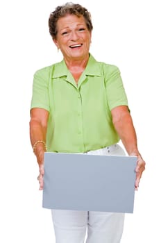 Close-up of a woman showing a placard and smiling isolated over white