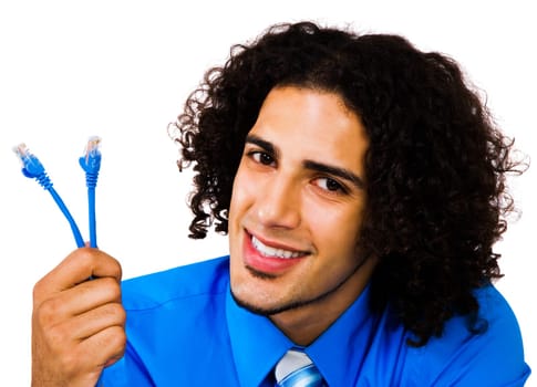 Handsome businessman holding Rj45 cables isolated over white