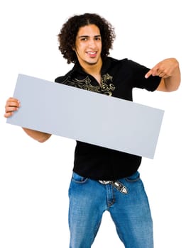 Latin American man showing an empty placard isolated over white