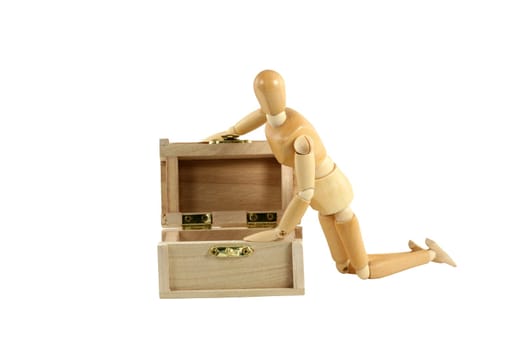 A Wooden manikin opening treasure chest