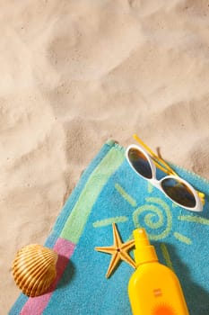 beach items  on a towel with copy-space