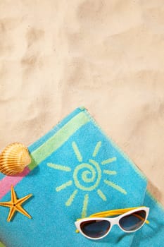 beach items  on a towel with copy-space