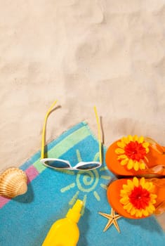 beach items  on a towel with copy-space