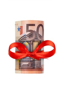 Rolled up eighty euro with red ribbon isolated on white background
