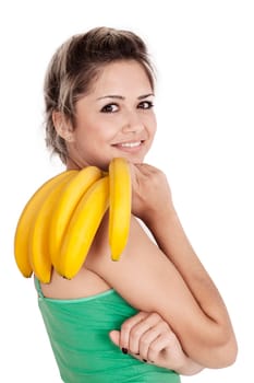 Toothy smile portrait of a beautiful young woman with bananas