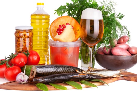 Arrangement of smoked Fish and Ingredients with glas Beer. Isolated on white