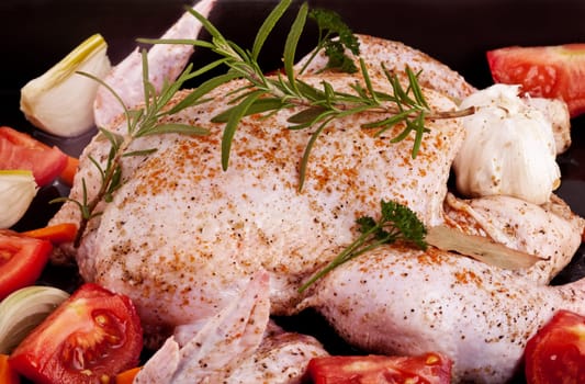 raw Chicken whith Provençal herbs and vegetables