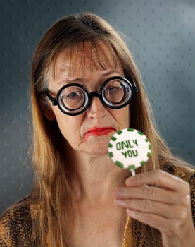woman with Granny Glasses very happy and excited for her gift / present.