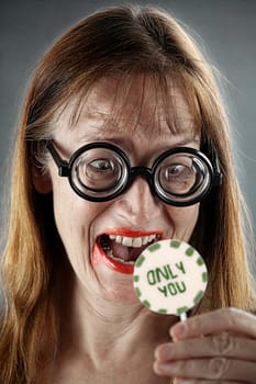 woman with Granny Glasses very happy and excited for her gift / present.