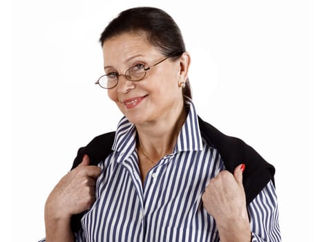 Portrait of a brunette woman wearing a pair of dark rimmed eyeglasses with a great smile on her face