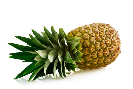 ripe pineapple with reflection isolated on white background