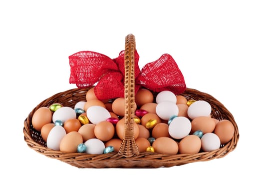 Easter Hens eggs in a basket with red Ribbon isolated on white