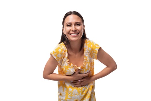 European woman with straight flowing black hair rejoices at good luck.